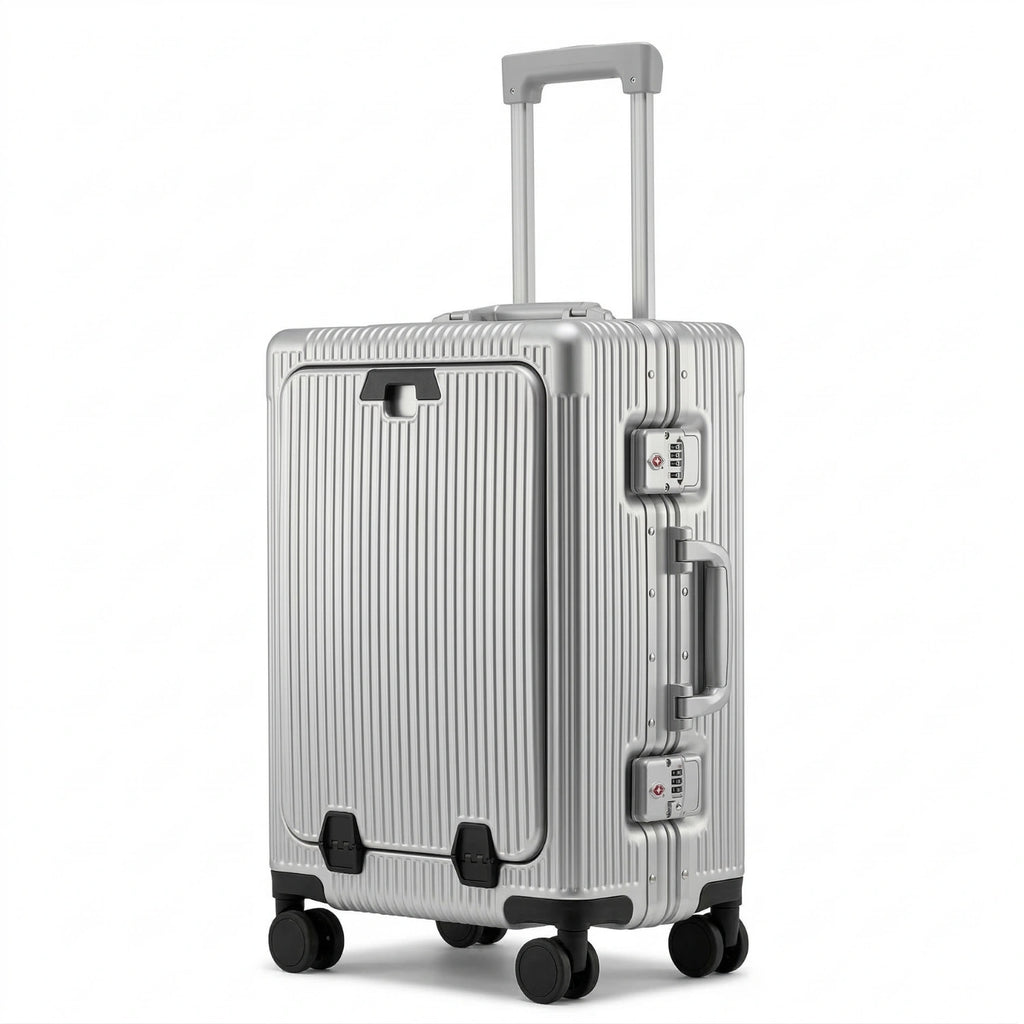 Valise cabine aluminium argentée rigide, bagage à main luxe avec roues multidirectionnelles et serrure TSA, design moderne rainuré pour voyageur.