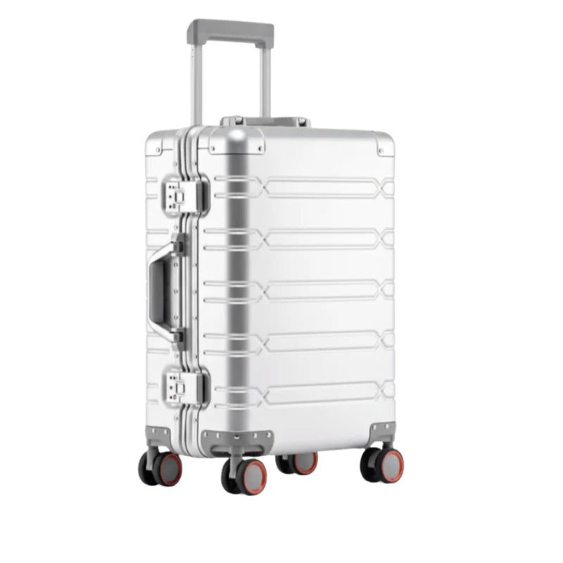 Vue latérale d'une valise en aluminium argenté avec roulettes rouges et poignée télescopique.